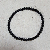 Pulsera Turmalina Negra Cuentas de 4 mm. Protección - Caleidoscopio